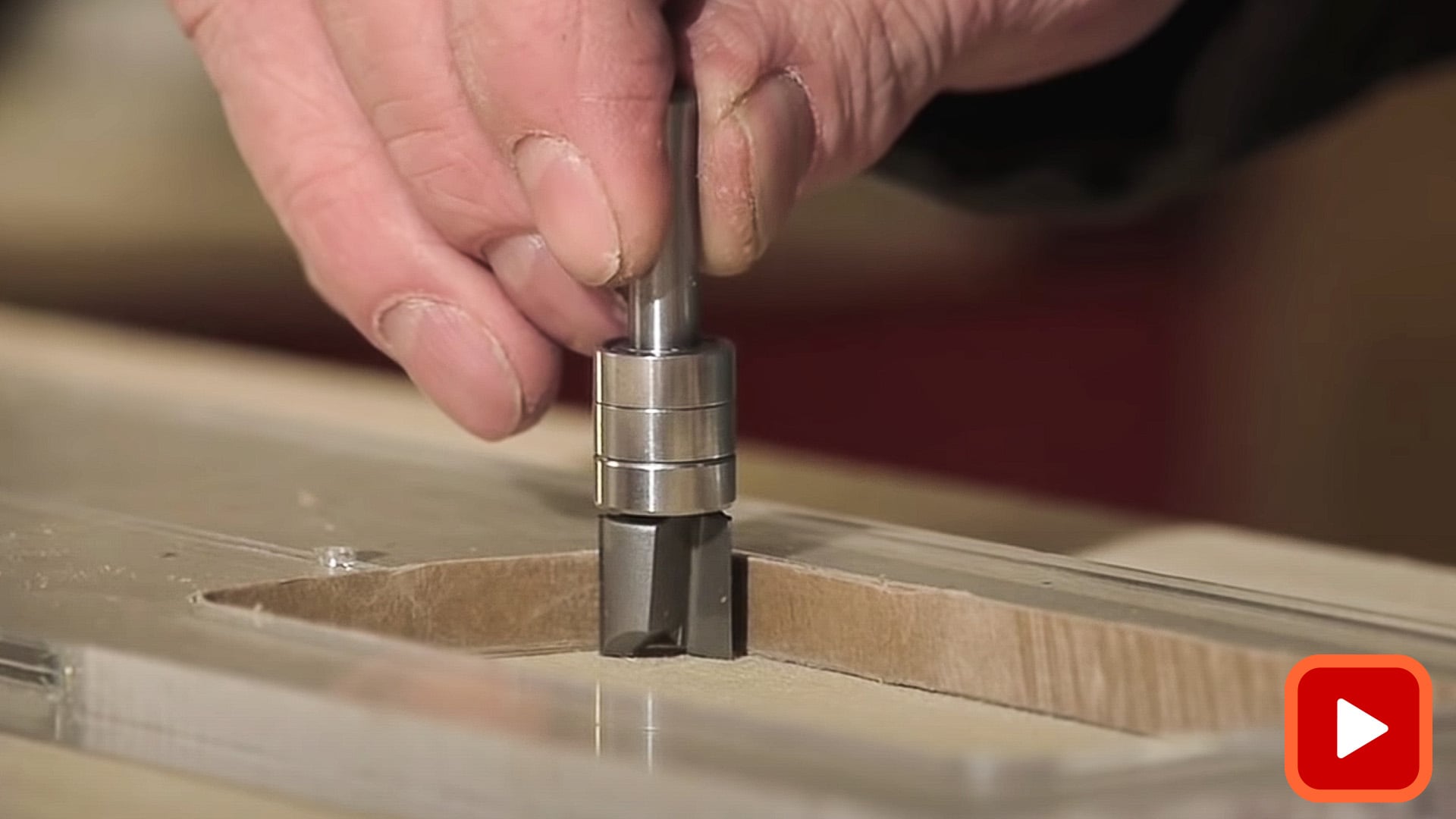 Router bit in a routing template